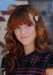 Cute-Long-Hairstyle-with-Bangs-from-Bella-Thorne